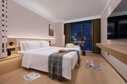 Xinzhou District Hotel | 上饶鹿华摹尔酒店经济开发区吾悦广场店 More Hotel Shangrao Wuyue Plaza
