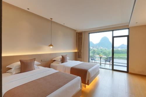 Yangshuo House | 山河恋江畔花园酒店