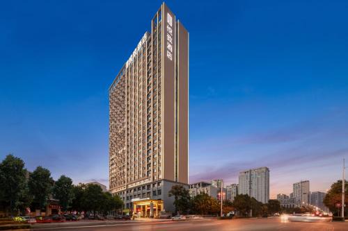 Louxing District Hotel | 悦致酒店娄底市政府店