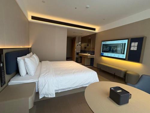 Chengqu District Hotel | 欢漫酒店大同古城火车站店