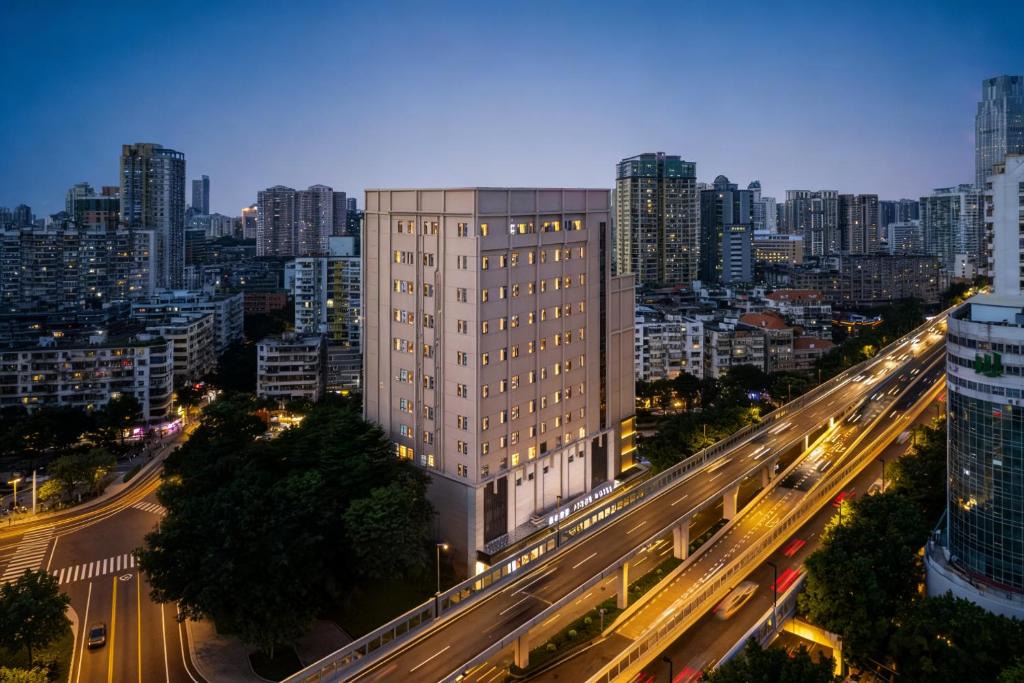 Yuexiu Hotel | 爱立斯水善坊HONORABLEINCOMPARADBLe北京路省人民医院近琶洲会展中心店