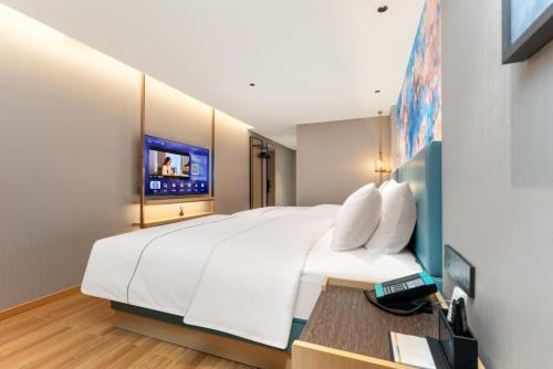 Enshi Hotel | 白玉兰商务酒店恩施火车站机场店