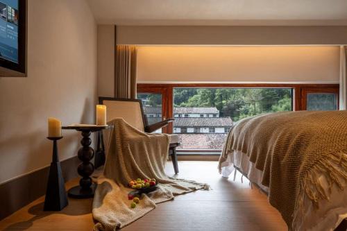 Chizhou Hotel | 花筑九华山归野慢山民宿肉身宝殿店