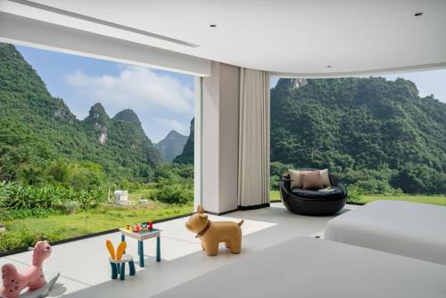 Yangshuo Hotel | 阳朔山野集宿度假酒店 遇龙河千古情店