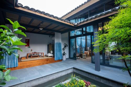 Huizhou District House | Blue House X Space 丨 Intangible Cultural Heritage Blue Dyeing 丨 Coffee Hostel