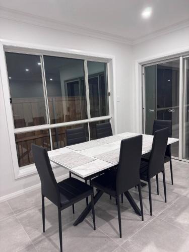 Norwest House | Cozy 4BedroomHouse Rental in Kellyville, Sydney