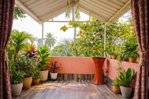Behala House | cozy room with balcony