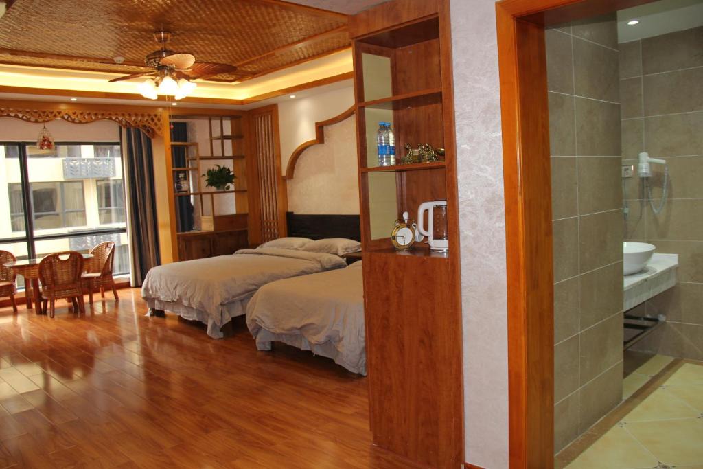 Jinghong Apartment | Doudou Meilan Fengqing Inn