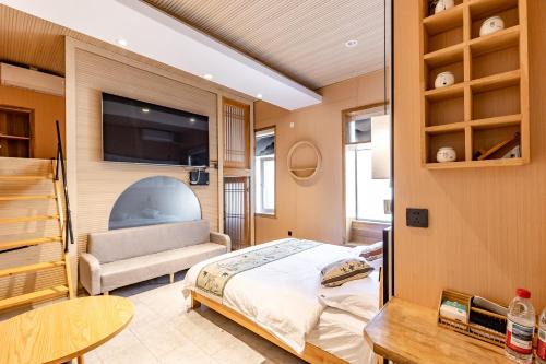 Dongcheng Hotel | Jinggu Sihe Beiluoguxiang Guesthouse