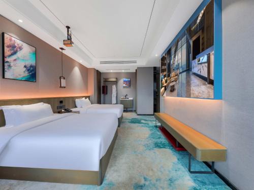 Erqi District Hotel | Madison Hotel Zhengzhou South University Road