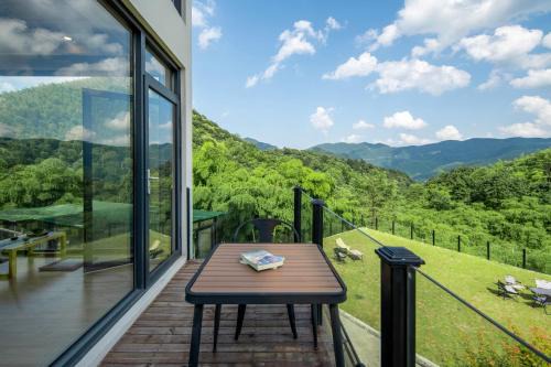 Anji Hotel | ManToo · Forest Above the Clouds Bamboo Hot Spring Resort(Anji Yu Village)