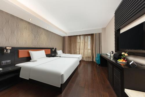 Liangxi District Hotel | Orange Crystal Hotel Wuxi Nanchang Street Sanyang Square