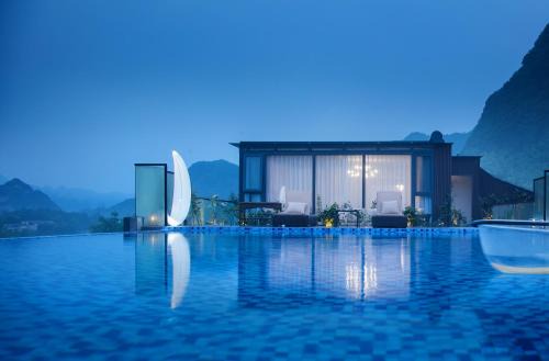 Wulingyuan Hotel | Pandora's Hilltop House Resort
