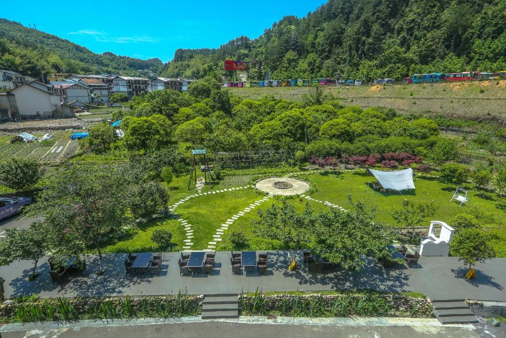 Chaqiyu Hotel | Pure House-Free shuttle Service to South Gate of the Forest Park,Attraction Tickets Serivce in advance, Mount View, Nature village and Tranguility