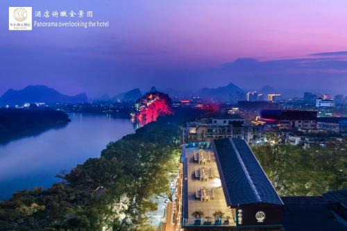 Xiufeng Hotel | Riverside Wing Hotel Guilin