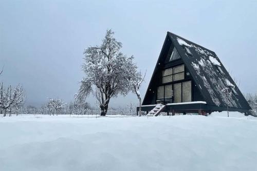 Srinagar Villa | StayVista at The Loft - A-Frame Structure, English Interiors, Bonfire