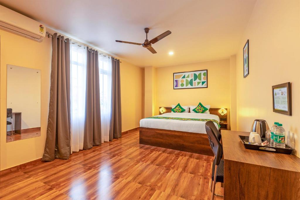 Beltola Hotel | Treebo Green Pearl Inn