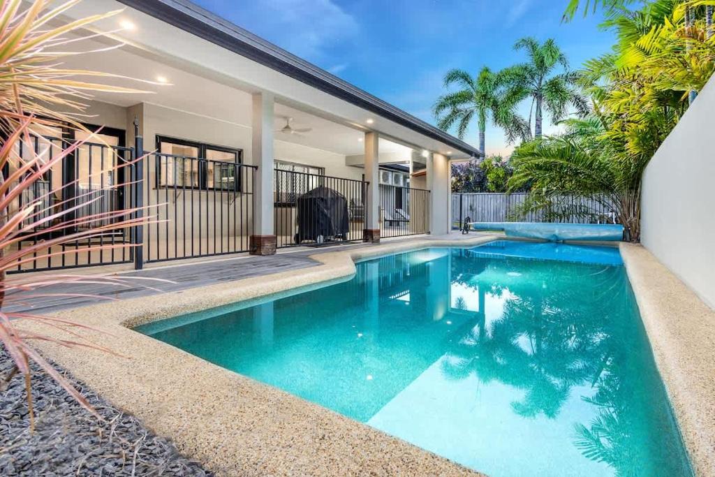 Kewarra Beach House | Tropical Pool Sanctuary in Kewarra Beach, Family and Dog Friendly