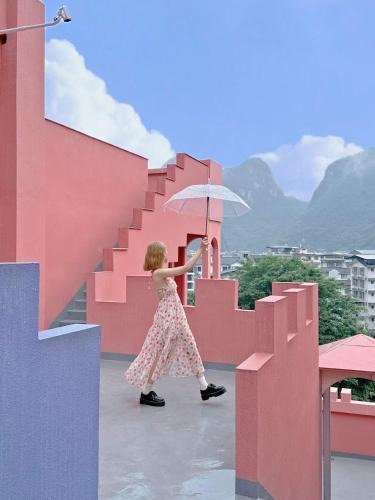 Yangshuo Hotel | Yangshuo B&G Hotel-Exclusive location,Roof Top Viewing Terrace,Seasonal swimming pool,Free Self-Service Laundry & Drying, Entrance Ticket Serivce, Local Trip plan,E-Scooter& English Customer Service