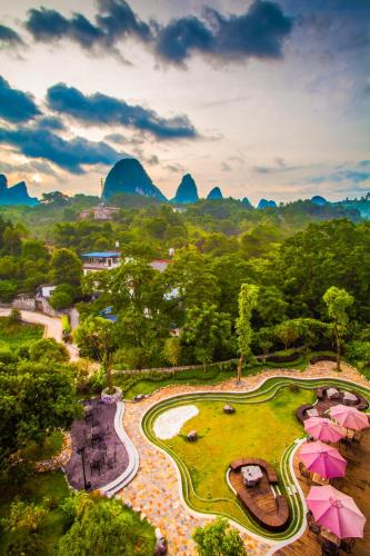 Yangshuo House | Yangshuo Courtyard Hotel-Free pick up from Airport or TS for 3 nights or more before July 15th