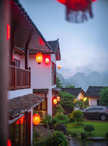 Wulingyuan Hotel | Zhangjiajie Ldyllic Pondside Timber Lodge Resort - Wulingyuan, Courtyard View, Free Airport Pickup & Travel Services