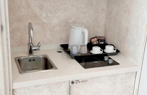 Tianya District Apartment | 三亚凤凰岛悦佳酒店