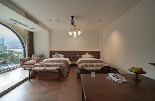Xiaguan Hotel | 云屿海花园海景酒店