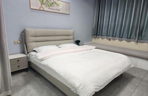 Qujiang District Apartment | 拾光民宿公寓酒店