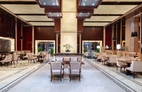 Chenggong County Hotel | 昆明呈贡南亚风情园豪生大酒店