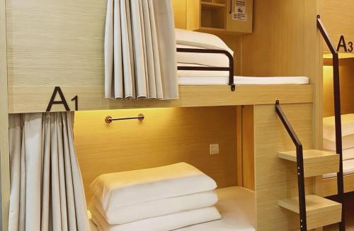 Longhua District Hostel | 泊金青年旅舍-深圳北站店