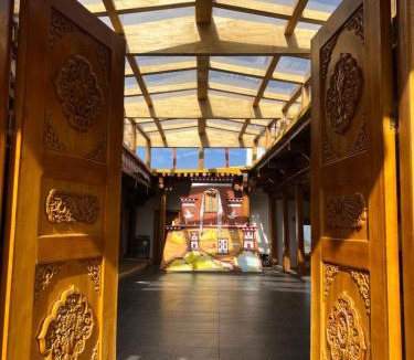 Garze House | 甲木参土司庄园