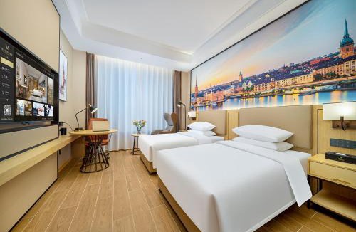 Long Hua Hotel | 维也纳国际酒店海口高铁东站吾悦广场店