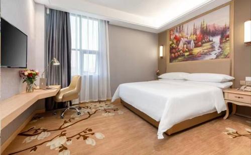 Shipai Hotel | 维也纳国际酒店生态园店