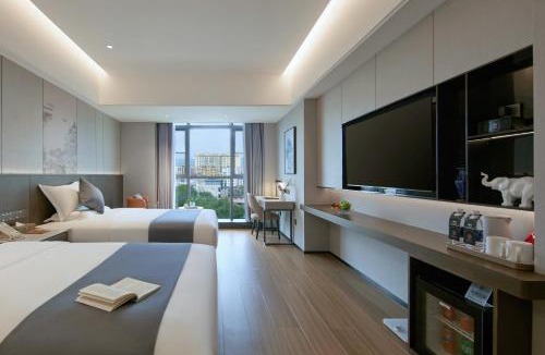 Yunjinghong Hotel | 西双版纳熙源国际酒店告庄泼水广场曼听公园店