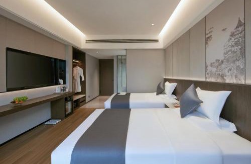 Yunjinghong Hotel | 西双版纳熙源国际酒店告庄泼水广场曼听公园店