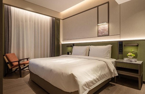 Tian Xin Hotel | 长沙五一广场欢致s酒店