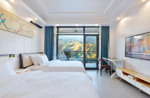 Longsheng Various Nationalities Autonomous County House | 龙胜风云酒店