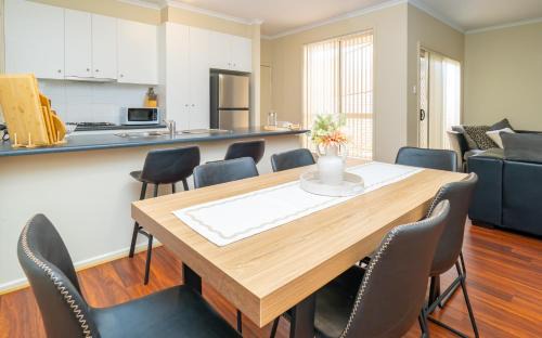 Blakeview Villa | 4 BR Home with Garage- short walk to shops, cafe, dining, and supermarkets