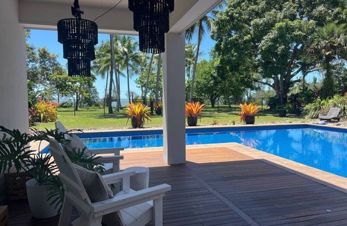 Kewarra Beach House | Absolute Beachfront Family Retreat with Heated Pool Sleeps 16