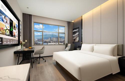Tengchong Hotel | Atour Hotel Tengchong Wenxing Building