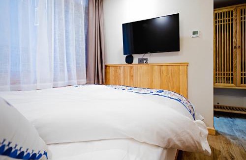 Wulingyuan Hotel | BaoFeng Lake Narrative Light Retreat-Chinese Style-Pick-up-ZhangjiajieTickets-LocalGuideService