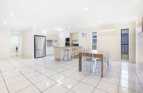 Bargara House | Bargara Haven Welcome to your personal oasis: Coastal calm blends with style.