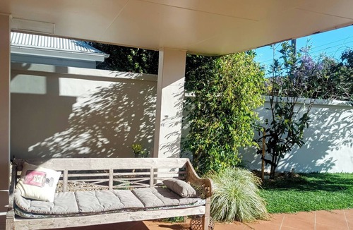 Kiama Apartment | Beautiful eclectic studio with lush private garden and solar heated pool