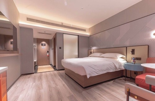 Wanxiu District Hotel | BORRMAN HOTEL WUZHOU