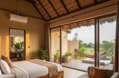 Sahibganj Resort | Charpai by the River