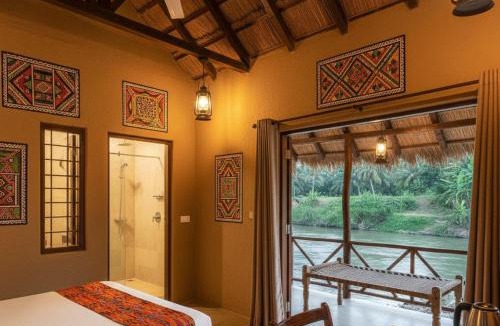 Sahibganj Resort | Charpai by the River