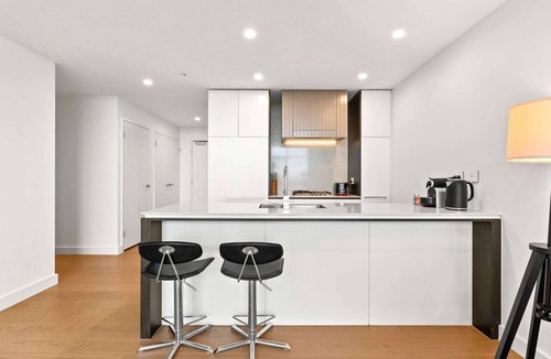 Wentworth Point Apartment | Chic 1-Bed with Pool by River, Ferry & Amenities