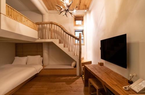 Guangling Qu House | cloud and wind