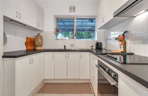 Payneham House | Colour Pop Cottage - A vibrant courtyard retreat perfect for long stays