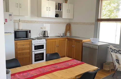 Bellerive Apartment | Comfy home within walking distance to beach, restaurants and Blunderstone area.